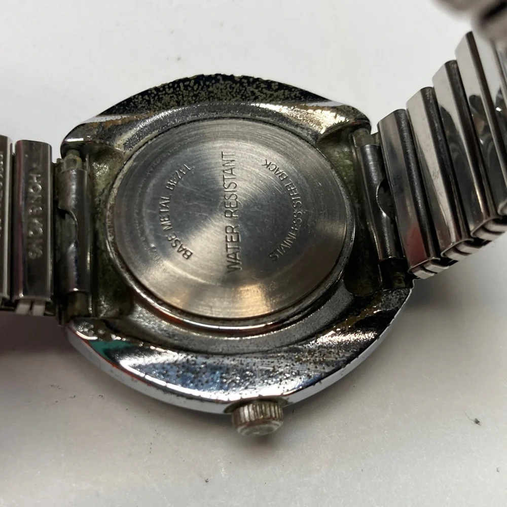 Vintage Timex black dial watch, works, stainless stretch bracelet